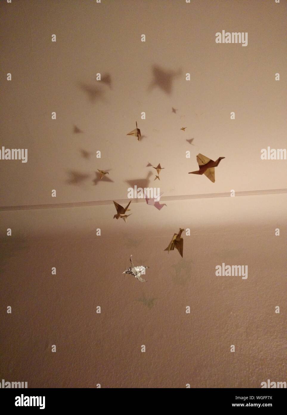 Origami paper hanging from ceiling hires stock photography and images