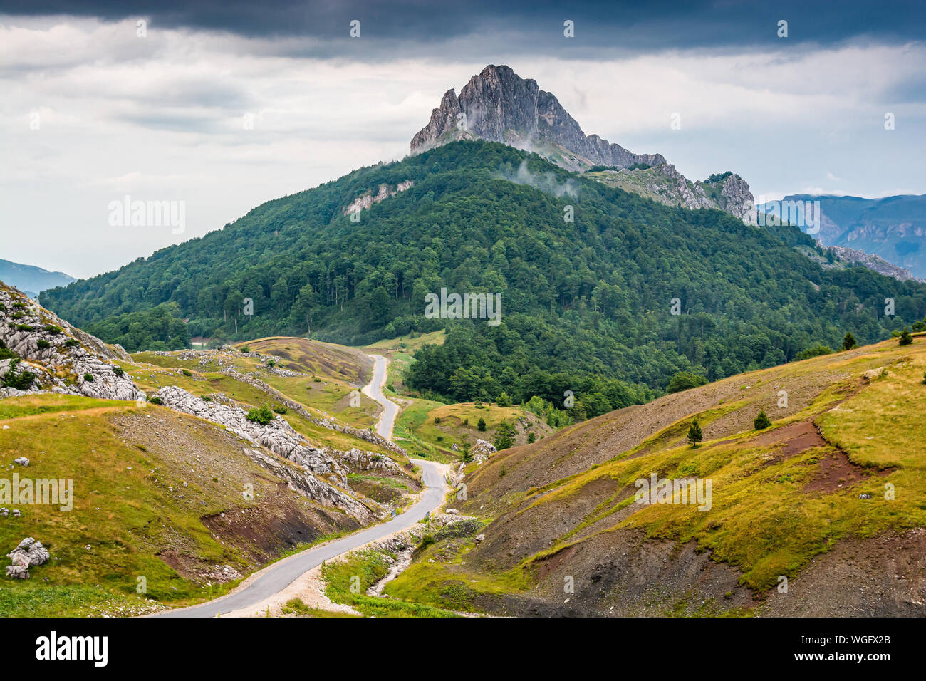 High peak Puzim with tar road in Bosnia and Herzegovina Stock Photo