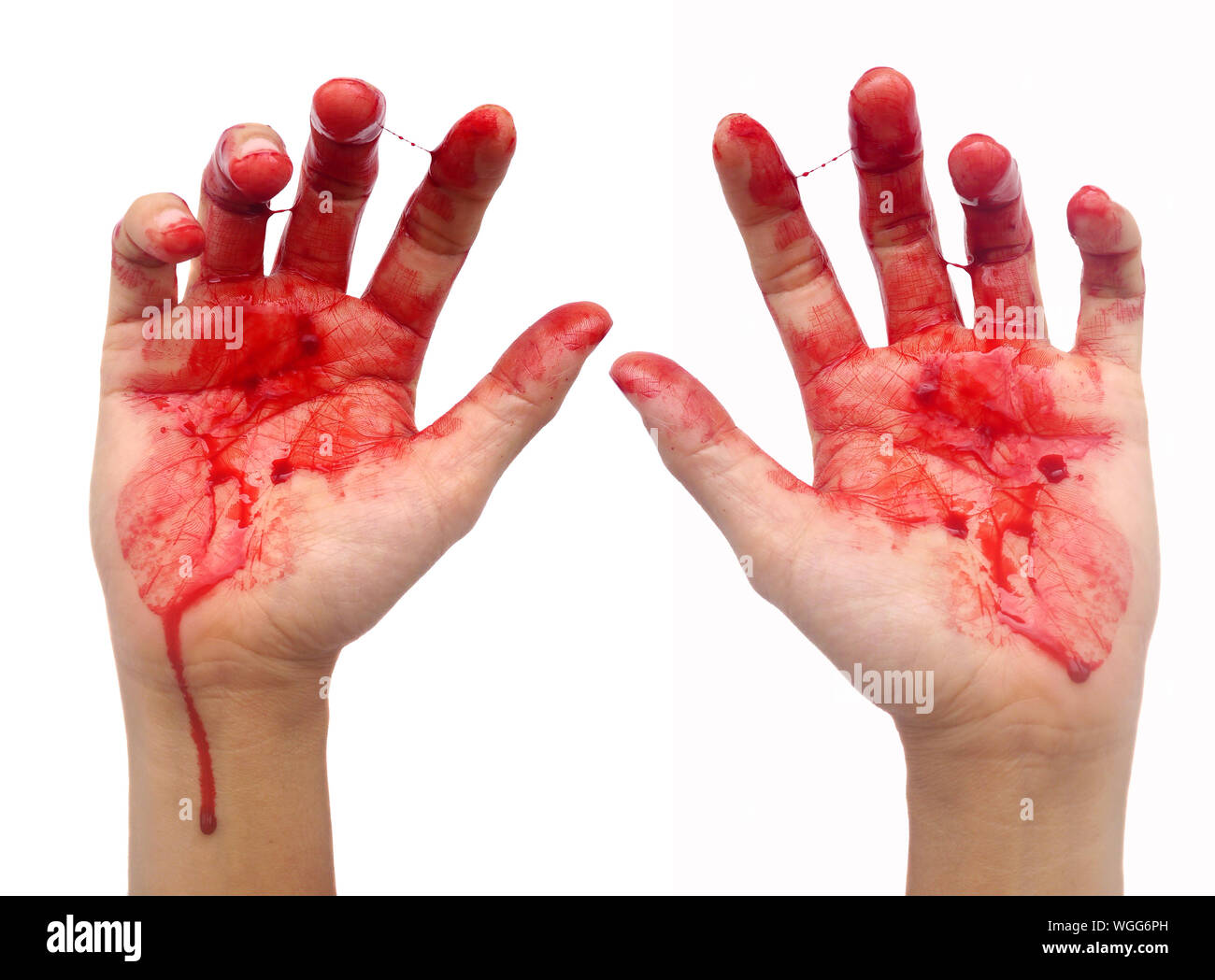 Cropped Image Of Blooded Hands Against White Background Stock Photo