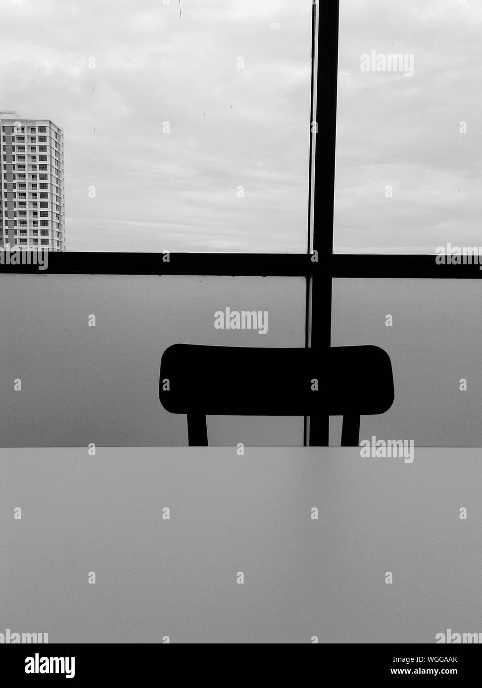 Empty Chair In Office Against Window Stock Photo Alamy