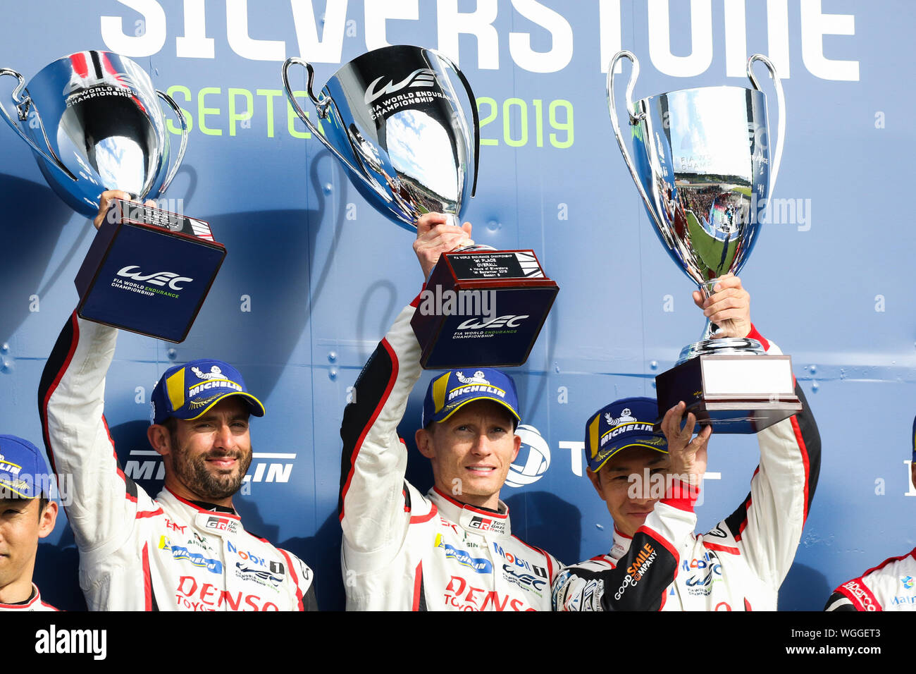 Silverstone UK. 01st Sep 2019. TOYOTA GAZOO RACING drivers celebrate victory on the podium. L R Jose Maria Lopez Mike Conway Kamui Kobayashi during the FIA World Endurance Championship at the Silverst...