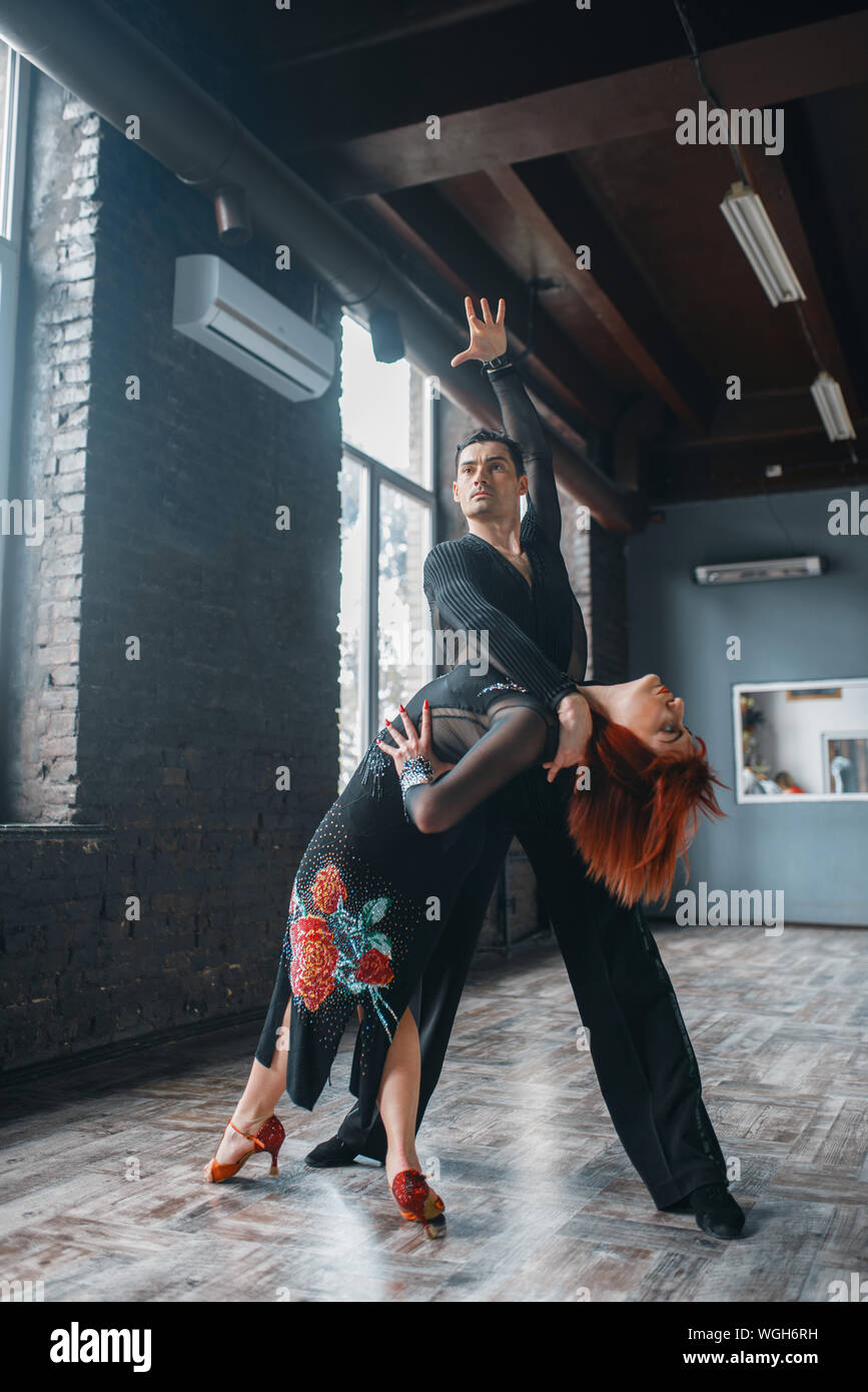 Man and woman on ballrom dance training in class Stock Photo
