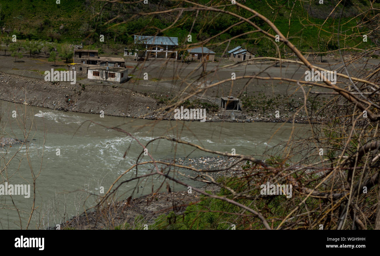 Panoramic view of the village beside river in himalayas Stock Photo