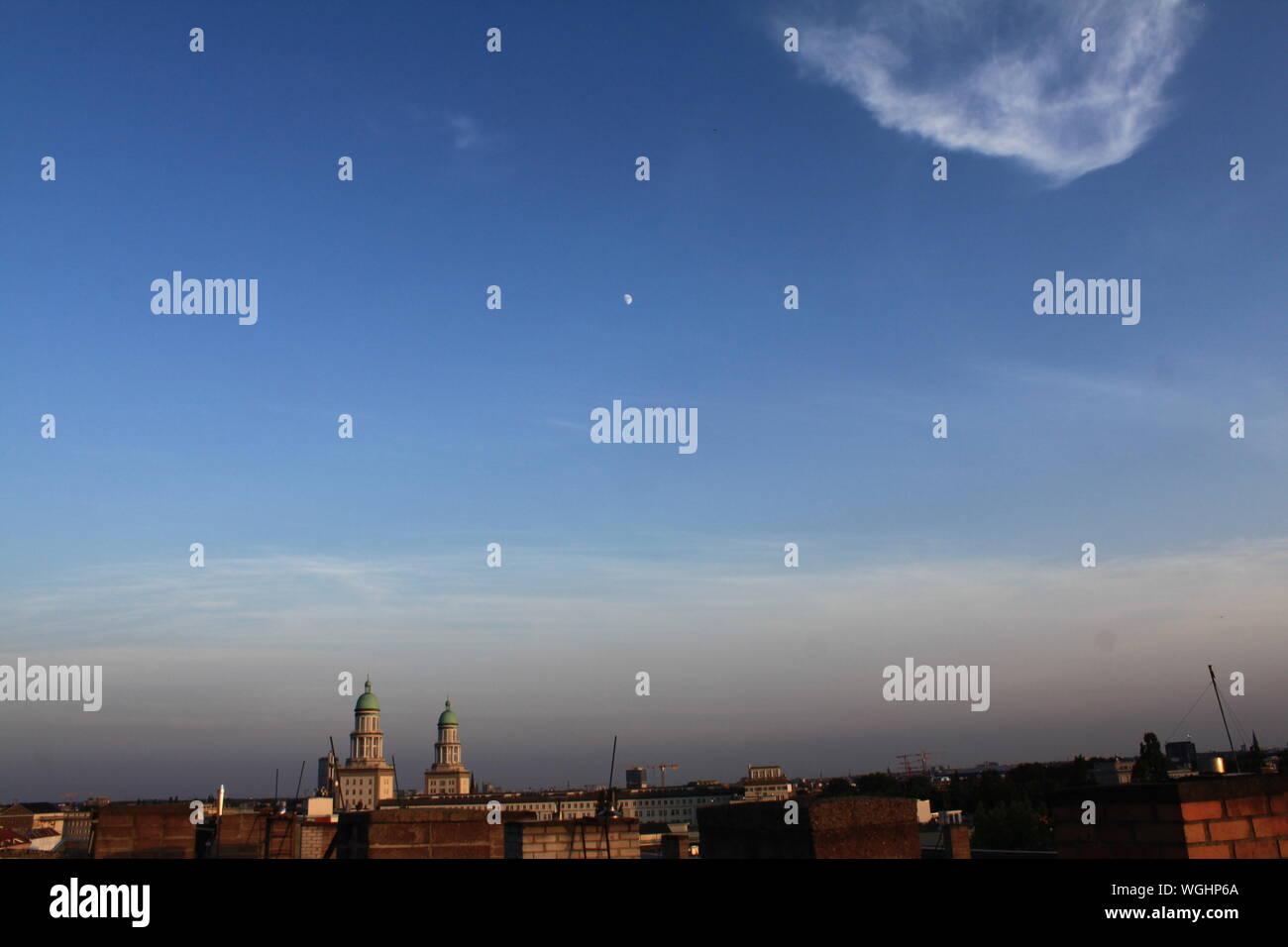 Distance View Of Frankfurter Tor Against Sky During Sunset Stock Photo