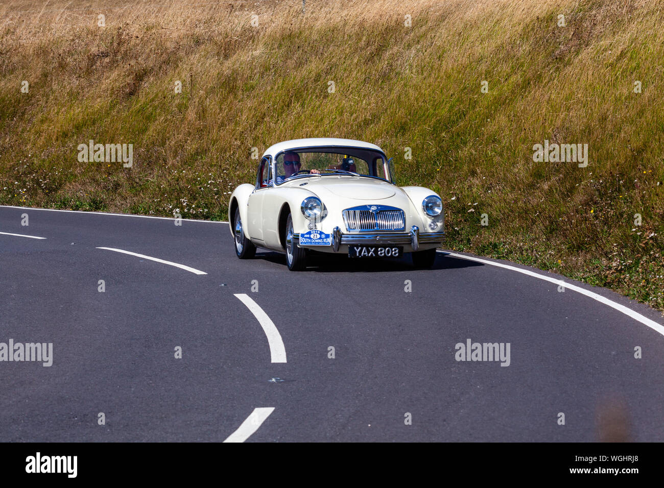 White 1960 MG A taking part in the annual South Downs Run. Stock Photo