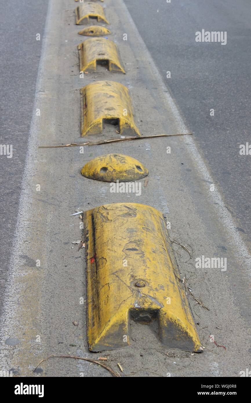 Yellow Plastic Protections On Road Stock Photo
