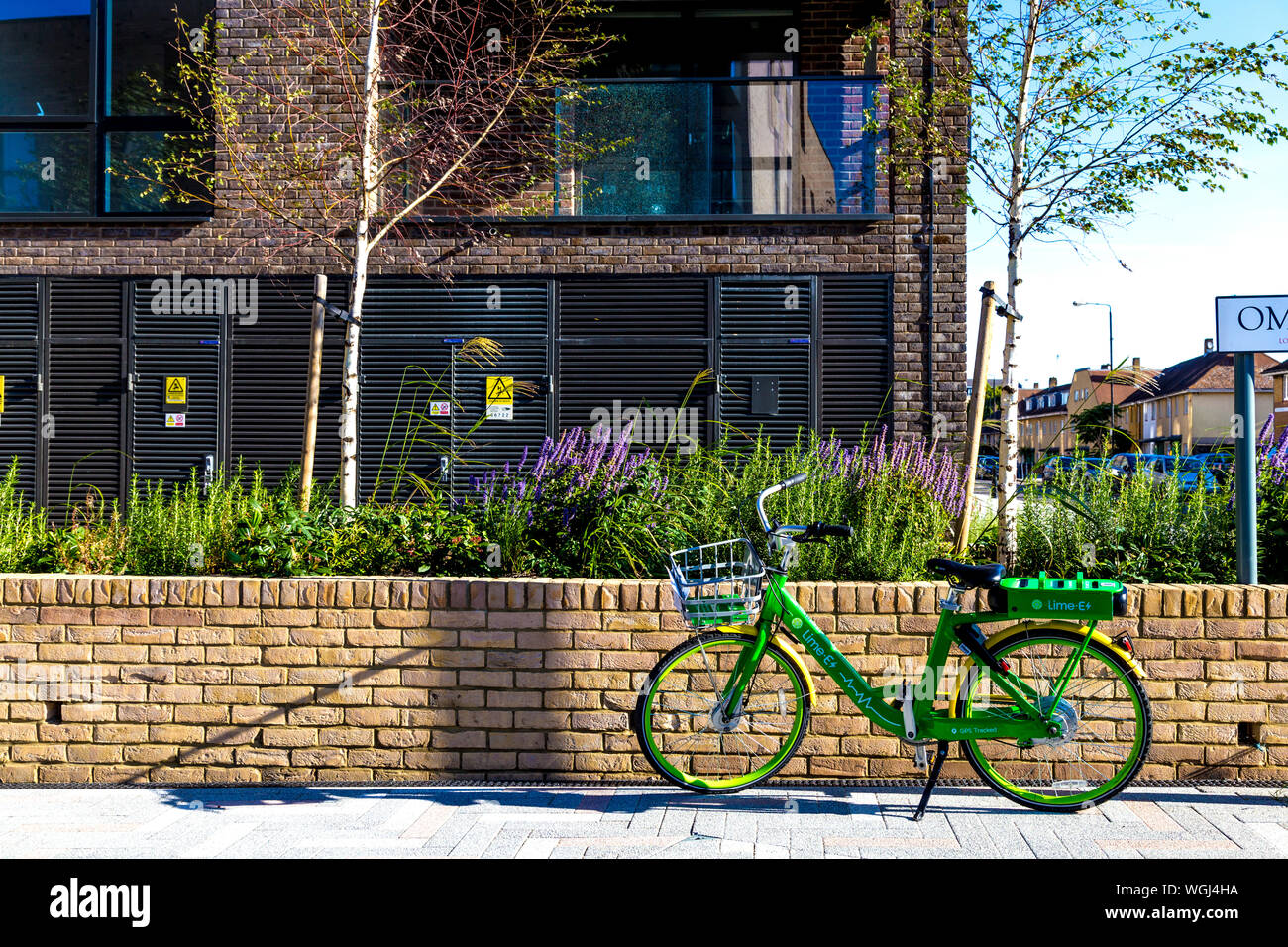 Lime-E electric bicycle parked on the street, London, UK Stock Photo