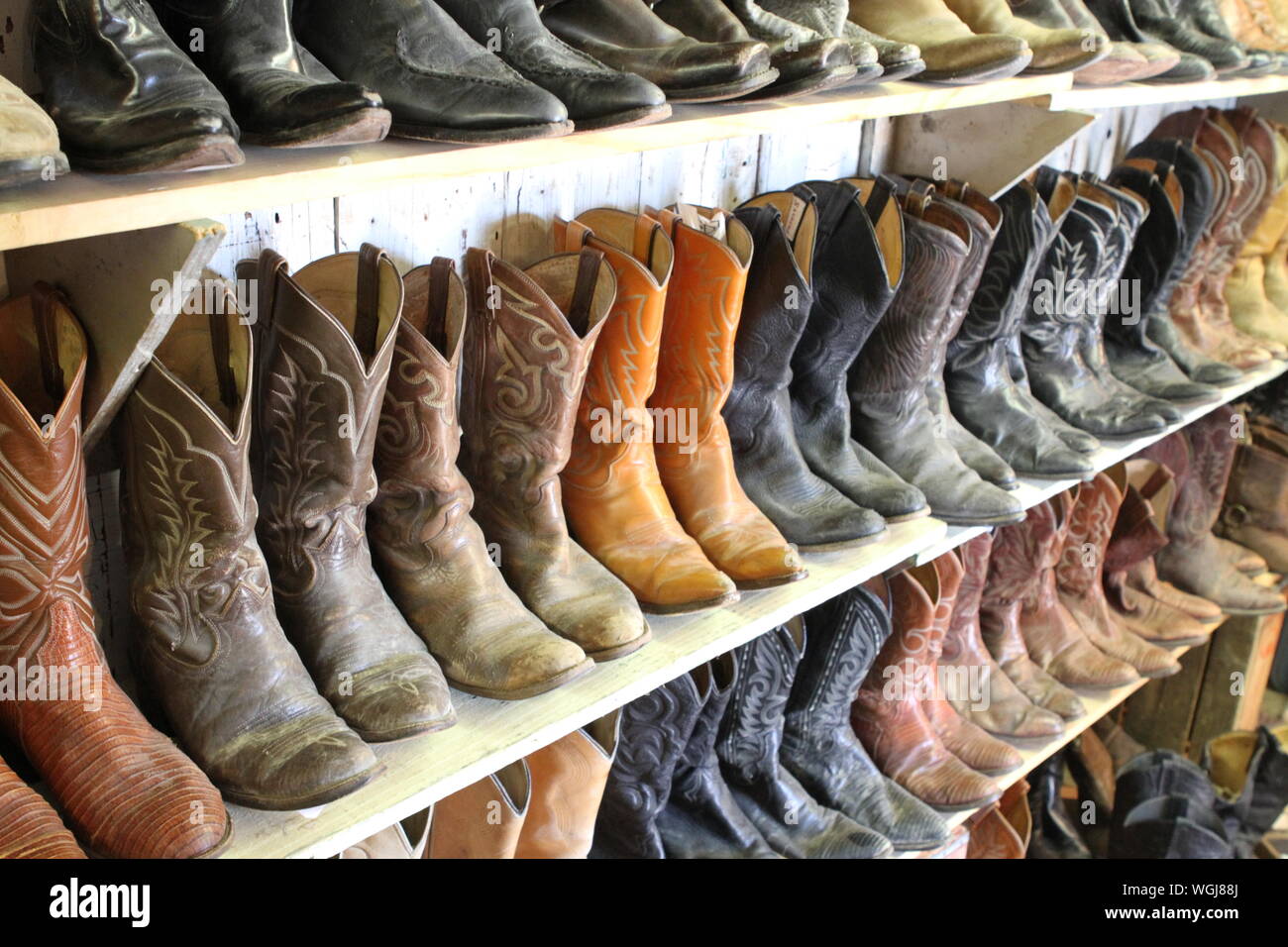 Shelves cowboy boots choice hires stock photography and images Alamy