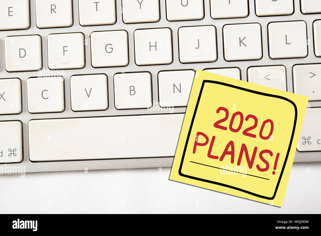 Text of 2020 plans on notice paper with computer keyboard, planning concept Stock Photo