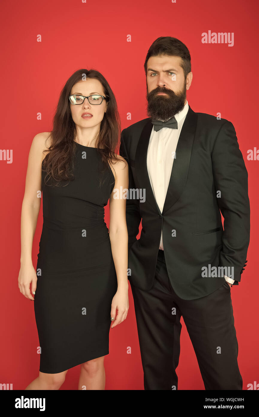 Bearded gentleman wear tuxedo girl elegant dress. Formal dress code.  Visiting event or ceremony. Couple ready for award ceremony. Main rules  picking clothes. Corporate party. Award ceremony concept Stock Photo by  ©stetsik