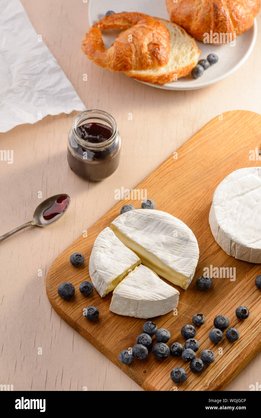 Brie cheese, blueberries and croissant Stock Photo Alamy
