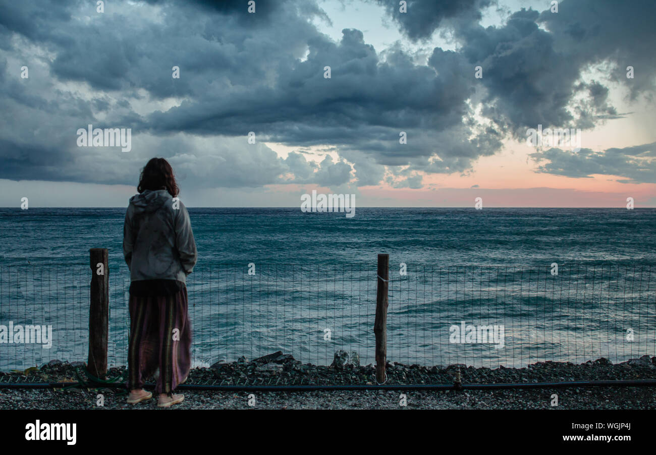 Person standing stormy sea hi-res stock photography and images - Alamy