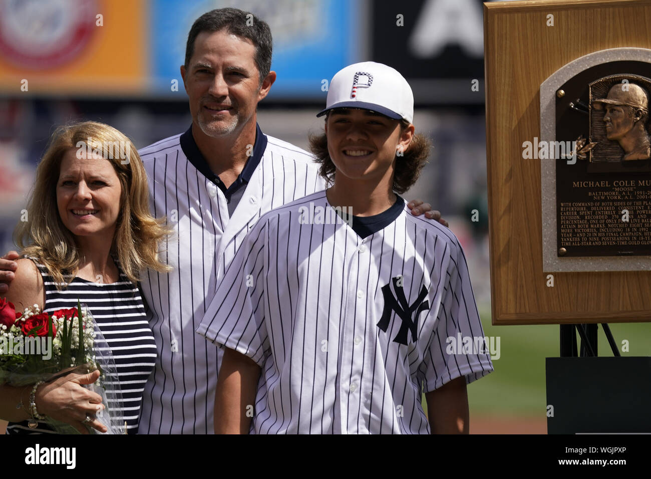Bronx, United States. 01st Sep, 2019. Former New York Yankees starting  pitcher Mike Mussina stands with his wife Jana McKissick (L) and son Brycen  Mussina (R) in front of his Hall of