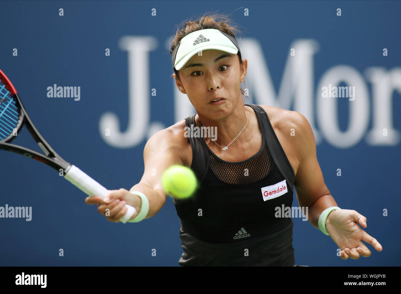 New York, United States. 01st Sep, 2019. Qiang Wang of China hits a forehand to Ashleigh Barty of Australia in the first set of the fourth round match at the 2019 US Open Tennis Championships at the USTA Billie Jean King National Tennis Center on Sunday, September 1, 2019 in New York City. Wang won 6-2, 6-4. Photo by Monika Graff/UPI Credit: UPI/Alamy Live News Stock Photo