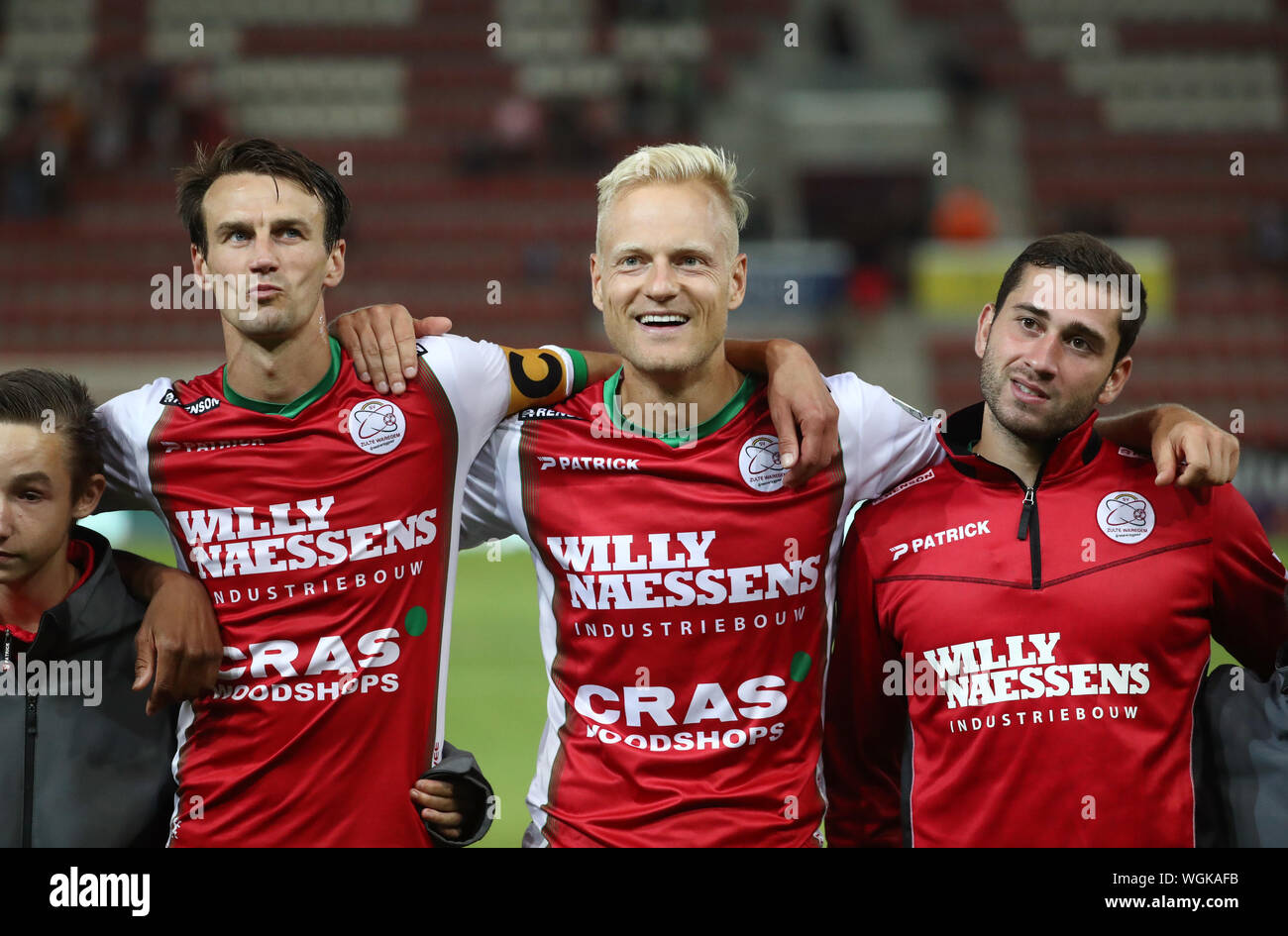 Waregem Belgium September 01 Davy De Fauw Of Zulte Olivier Deschacht Of Zulte And Luka Zarandia Of Zulte Celebrate After Winning The Jupiler Pro League Match Day 6 Between Zulte Waregem