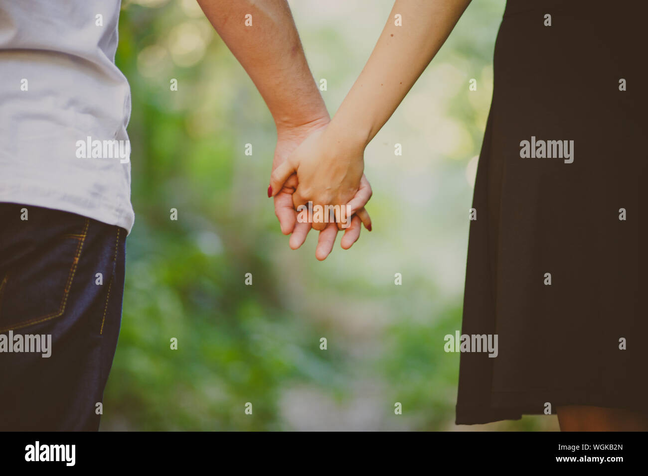 Man woman holding hands body hires stock photography and images Alamy