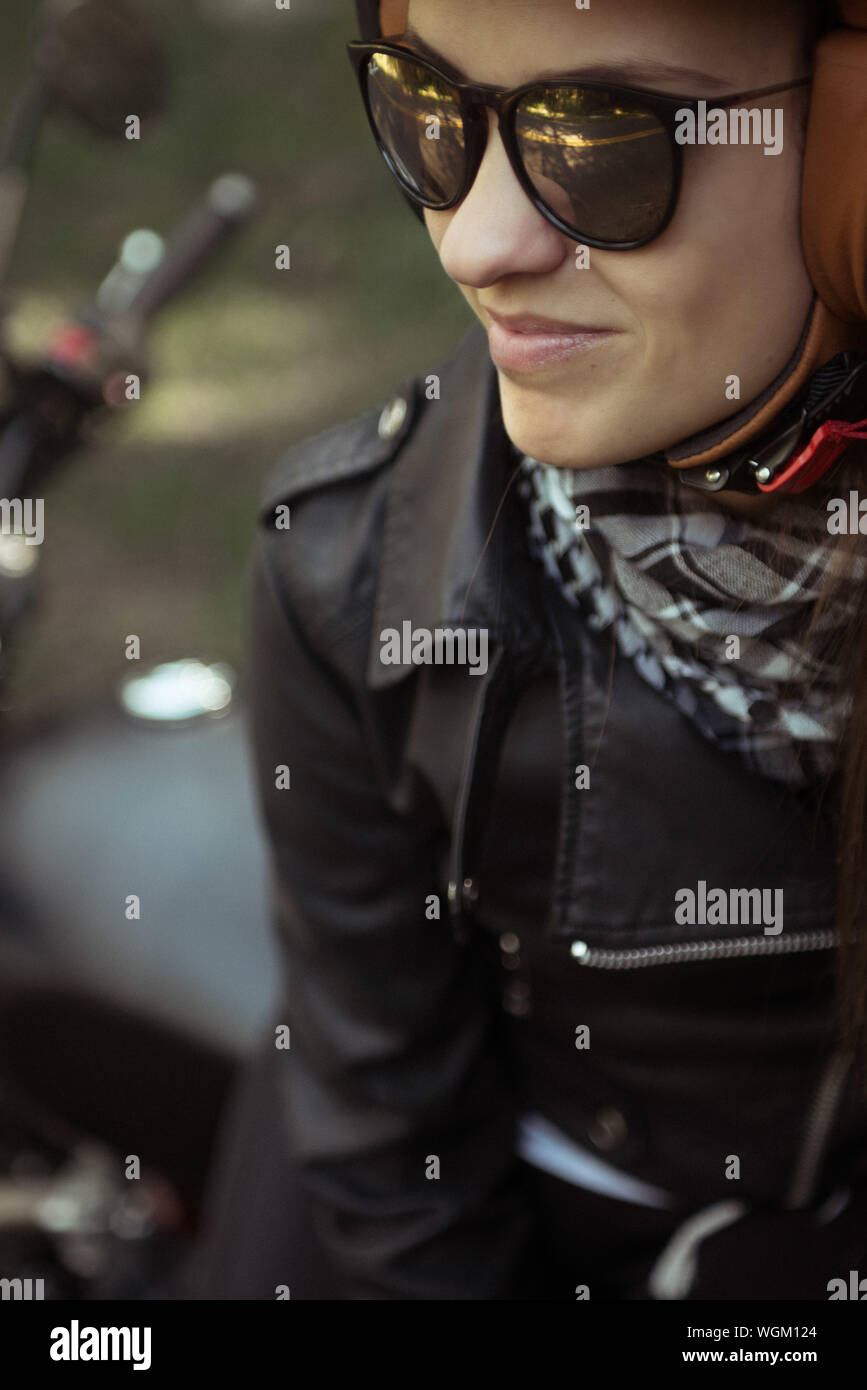 Sitting on motorcycle helmet hires stock photography and images Alamy