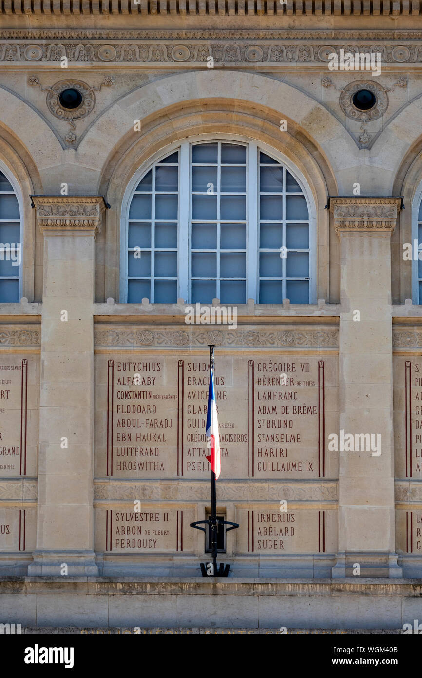 PARIS, FRANCE - AUGUST 04, 2018:  Exterior view of Sainte-Genevieve Library (Bibliotheque Sainte-Genevieve) on on Rue Cujas  with engraved names Stock Photo