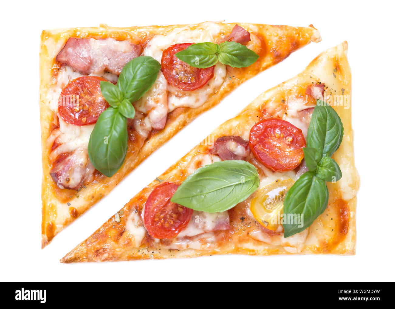 Pizza slices with basil isolated on white background Stock Photo