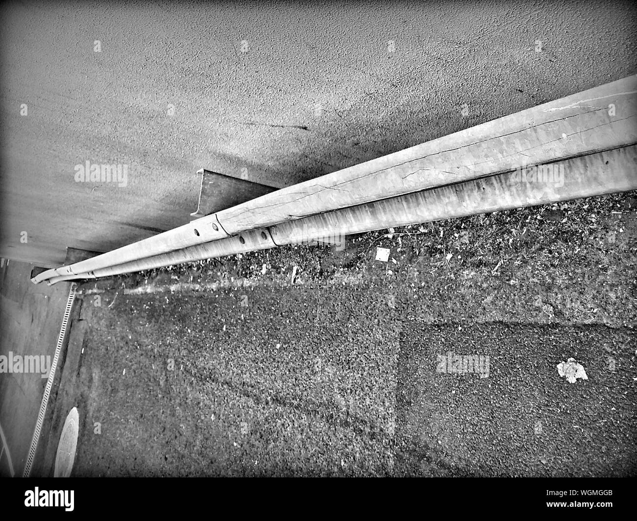 Surface Level Of Railing Against The Wall Stock Photo Alamy