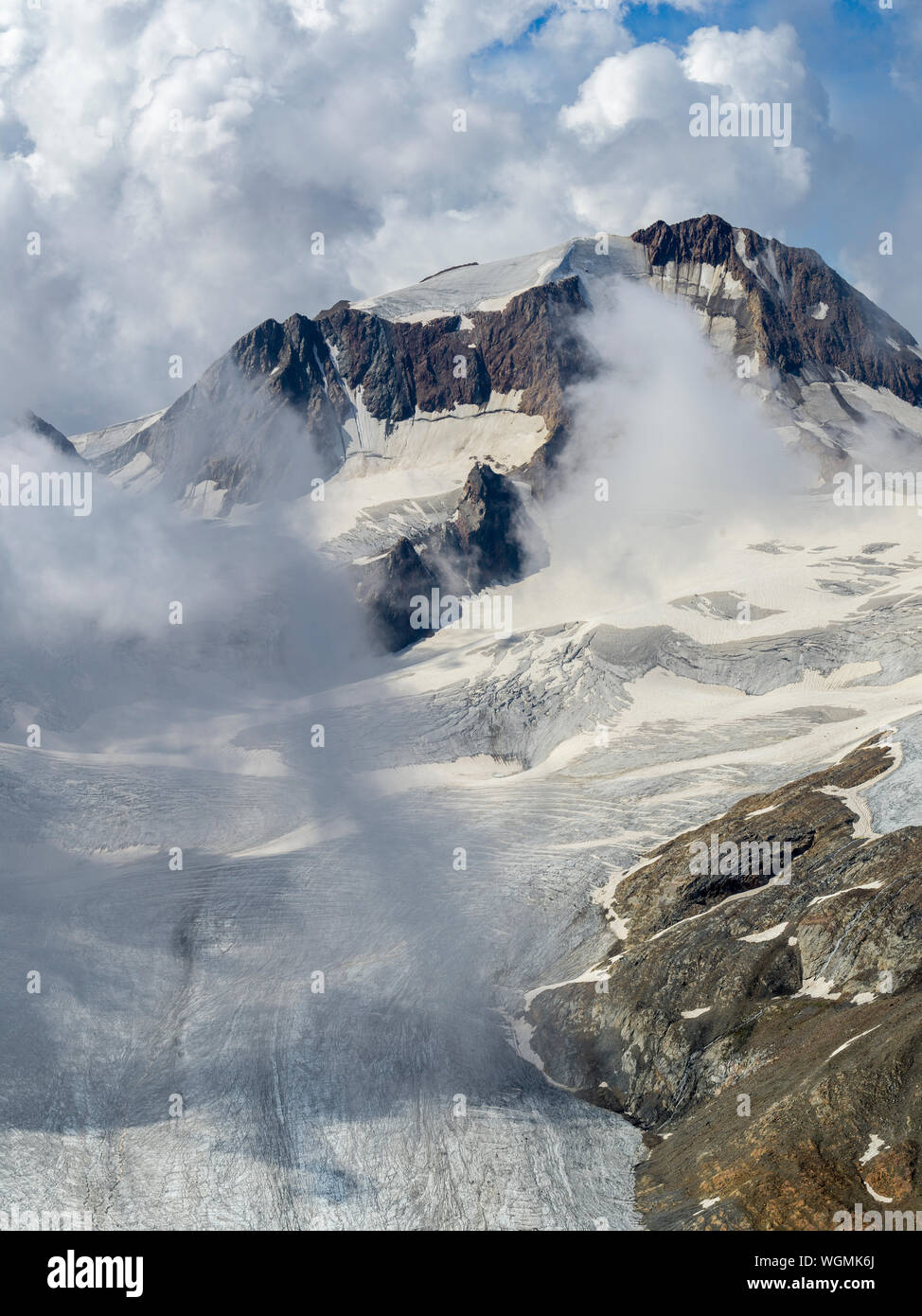 Mountain top view of Glacier Senales partly covered in clouds Stock Photo