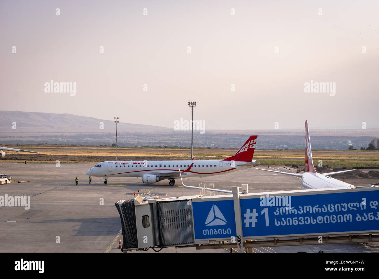 Tbilisi, Geogia - August 2019:  Georgian Airways aircraft on runway of Tbilisi Airport. Georgian Airways, formerly Airzena Stock Photo