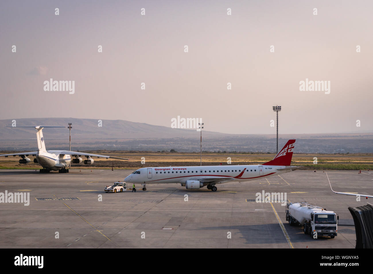Tbilisi, Geogia - August 2019:  Georgian Airways aircraft on runway of Tbilisi Airport. Georgian Airways, formerly Airzena Stock Photo