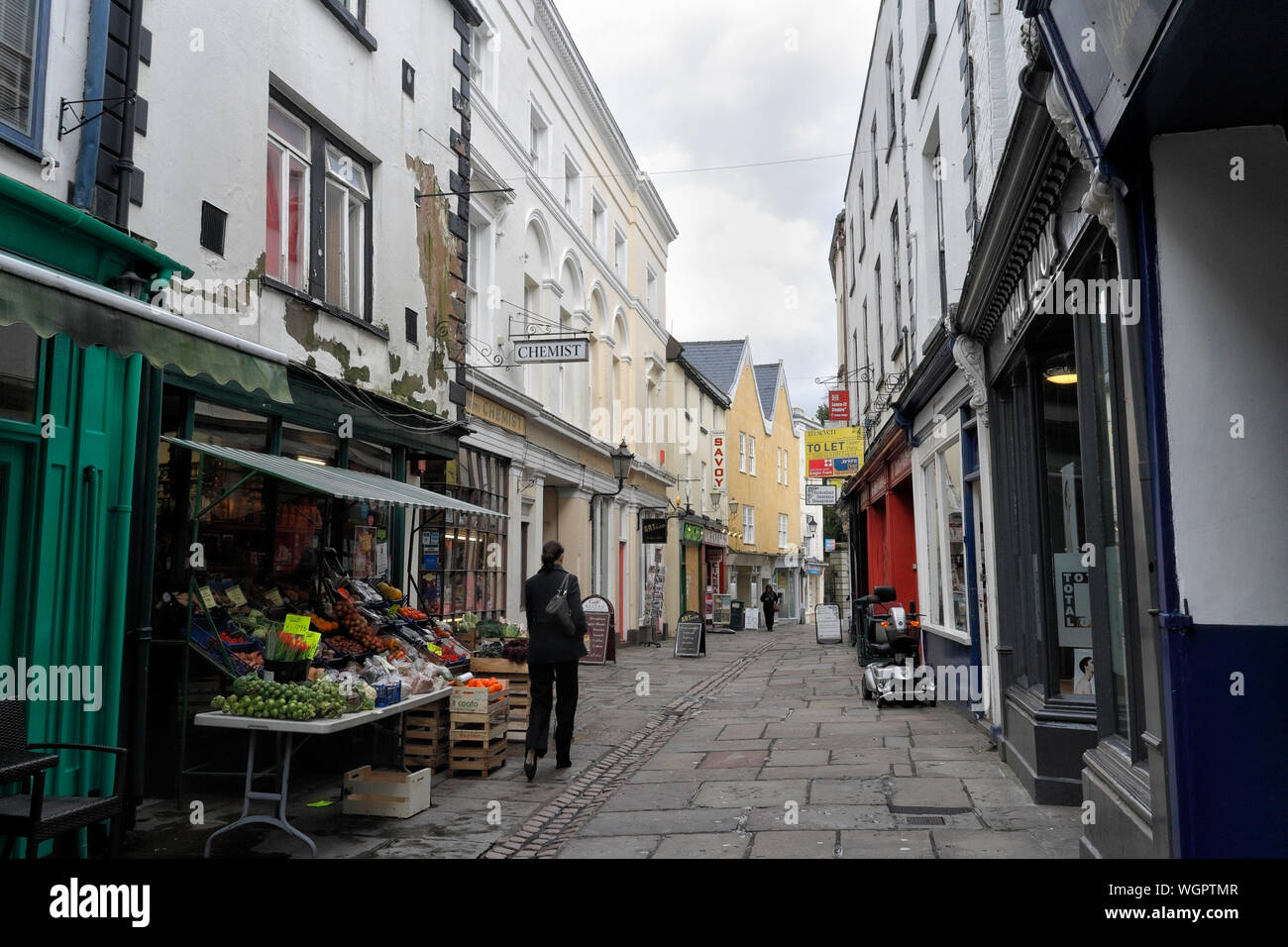 Shops in Church street in Monmouth Wales UK, Welsh town centre, narrow pedestrian street Stock Photo