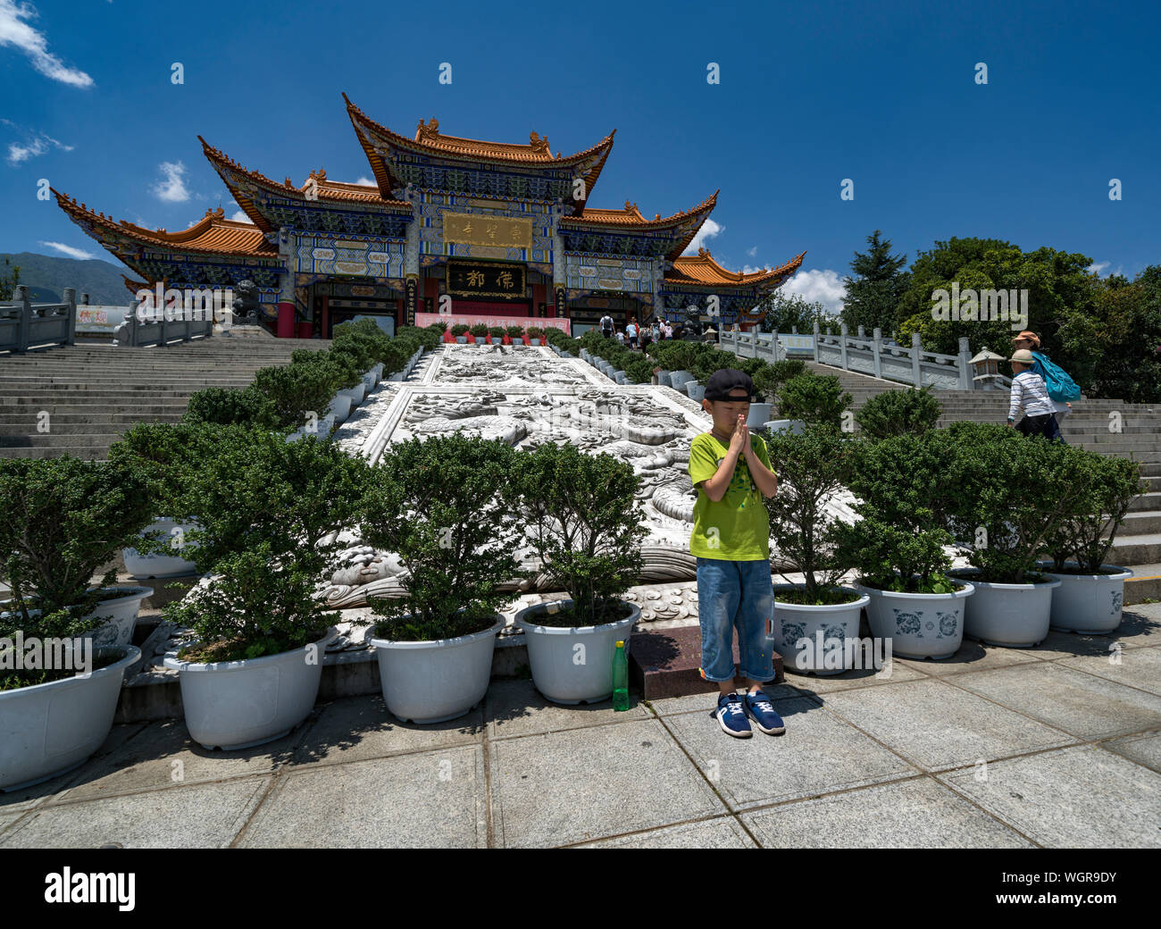 The Three Pagodas of Chongsheng Temple near Dali Old Town, Yunnan province, China. Scenic mountains are visible in background. Stock Photo