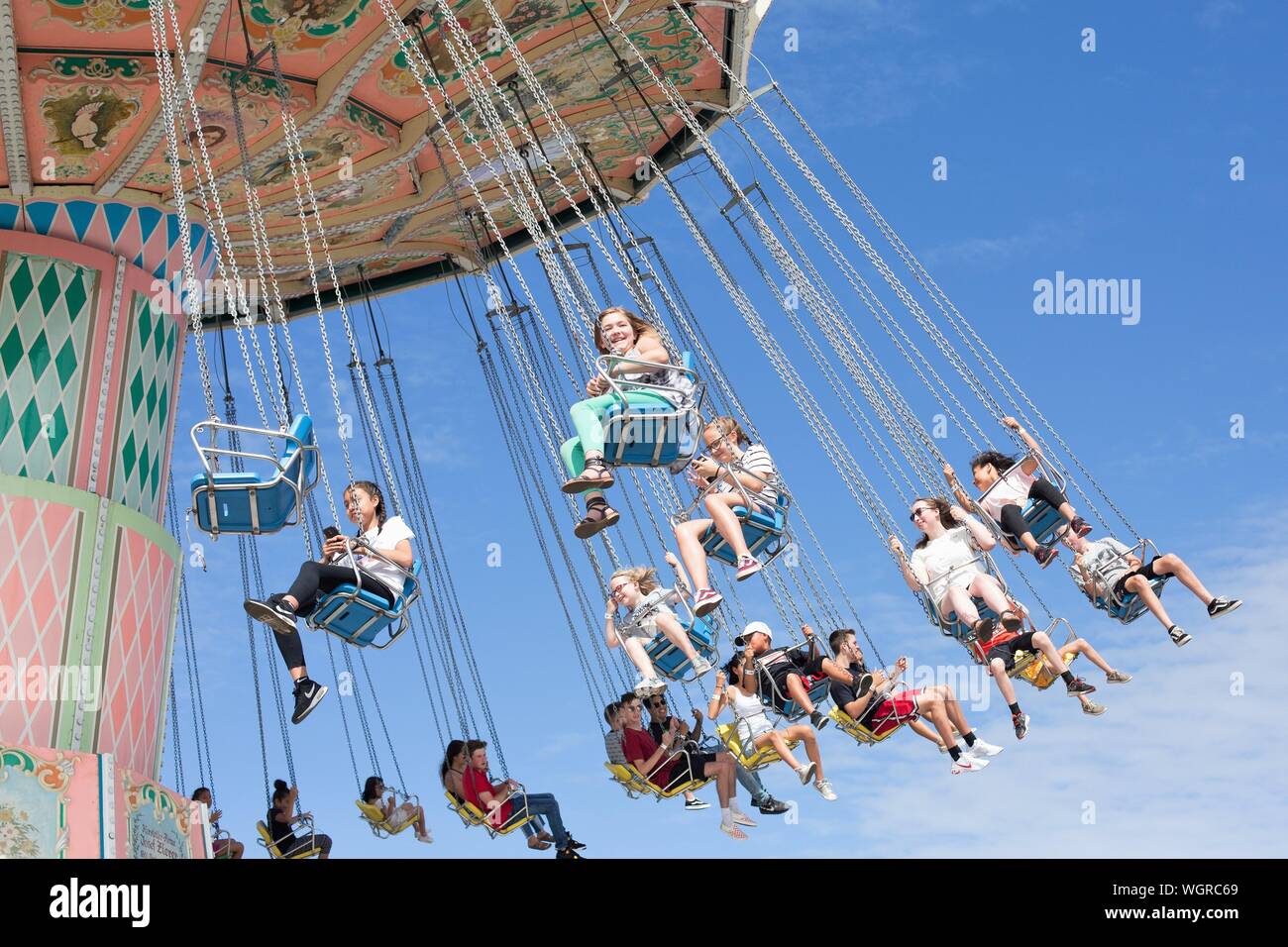 People Riding A Carnival Swing Ride At The Oregon State Fair