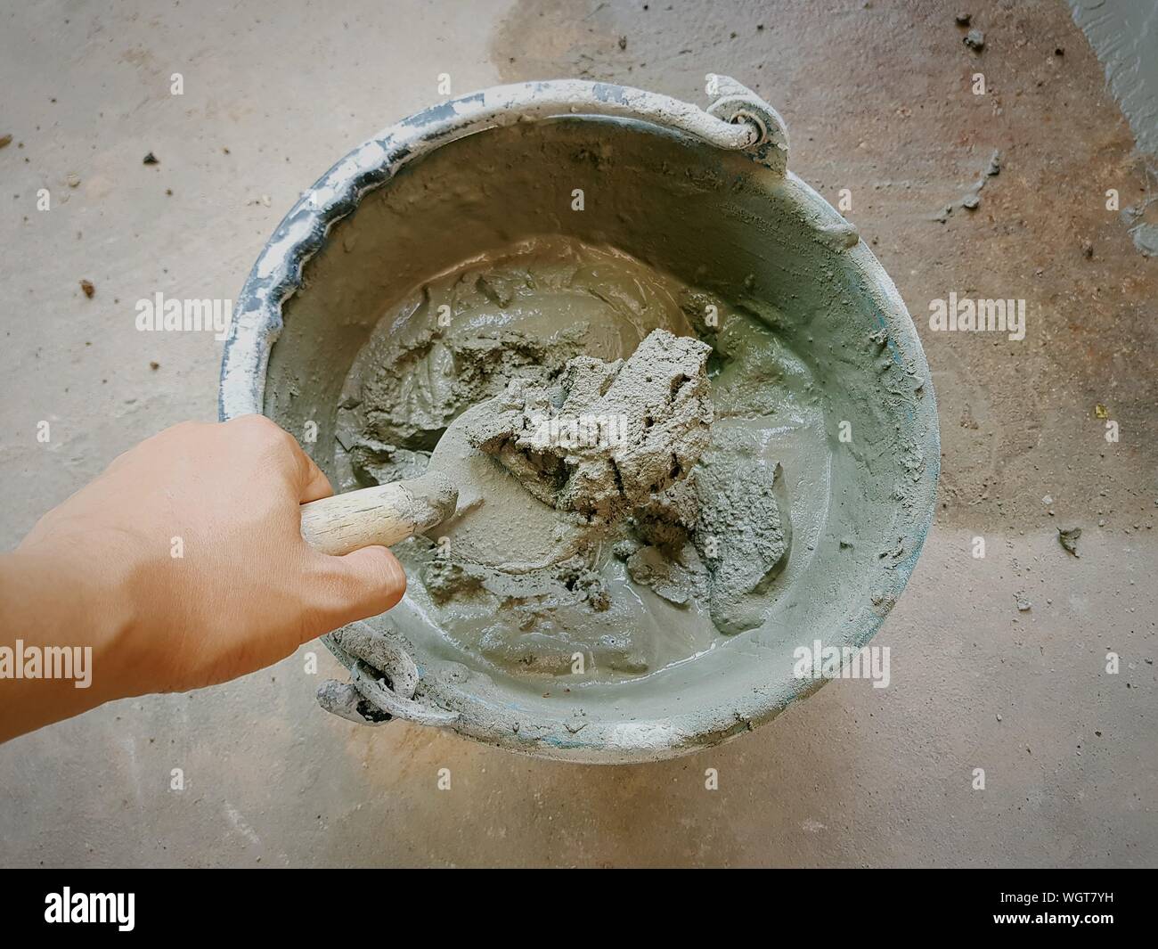 Mixing concrete hand hires stock photography and images Alamy