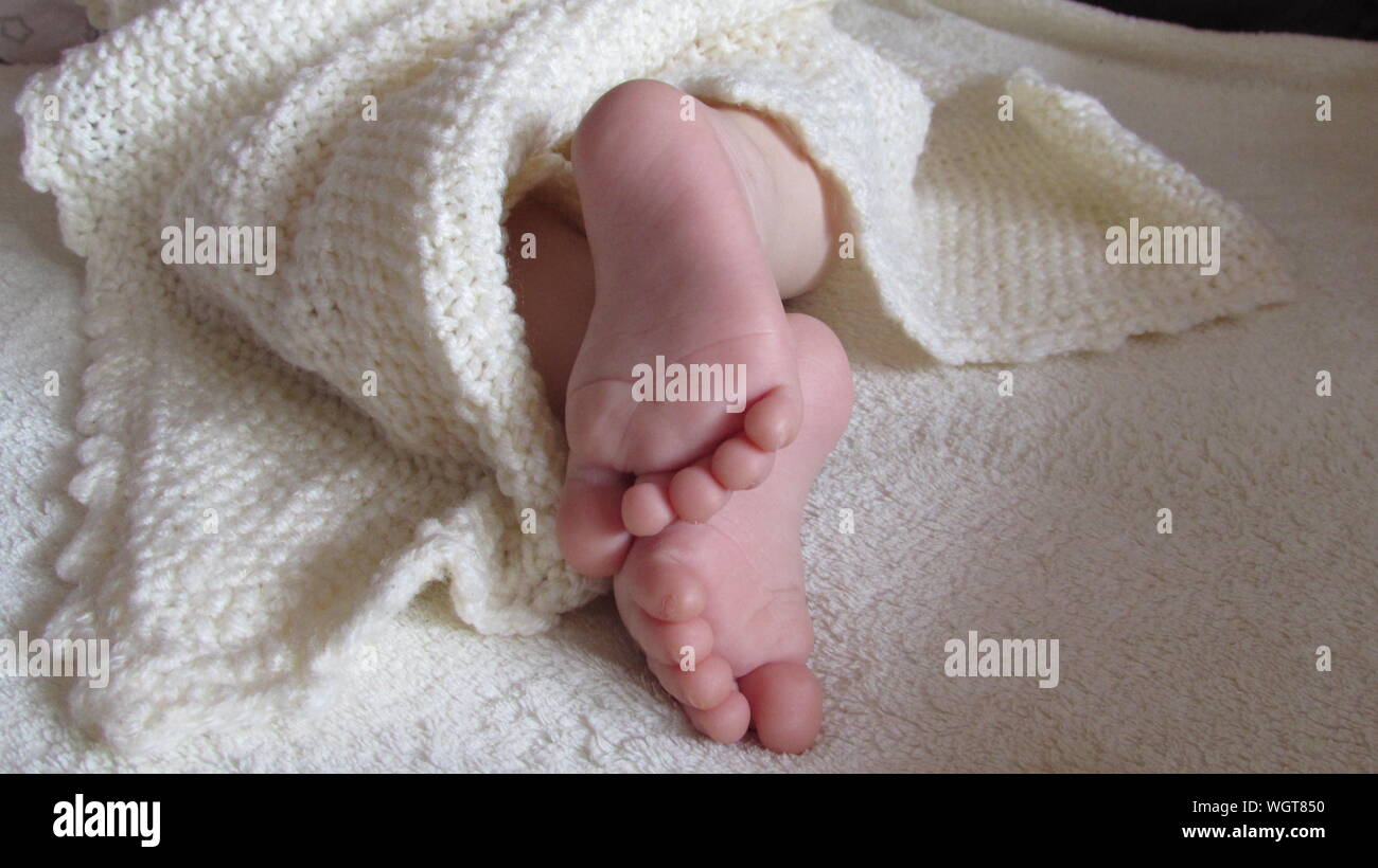 Rug feet hires stock photography and images Alamy