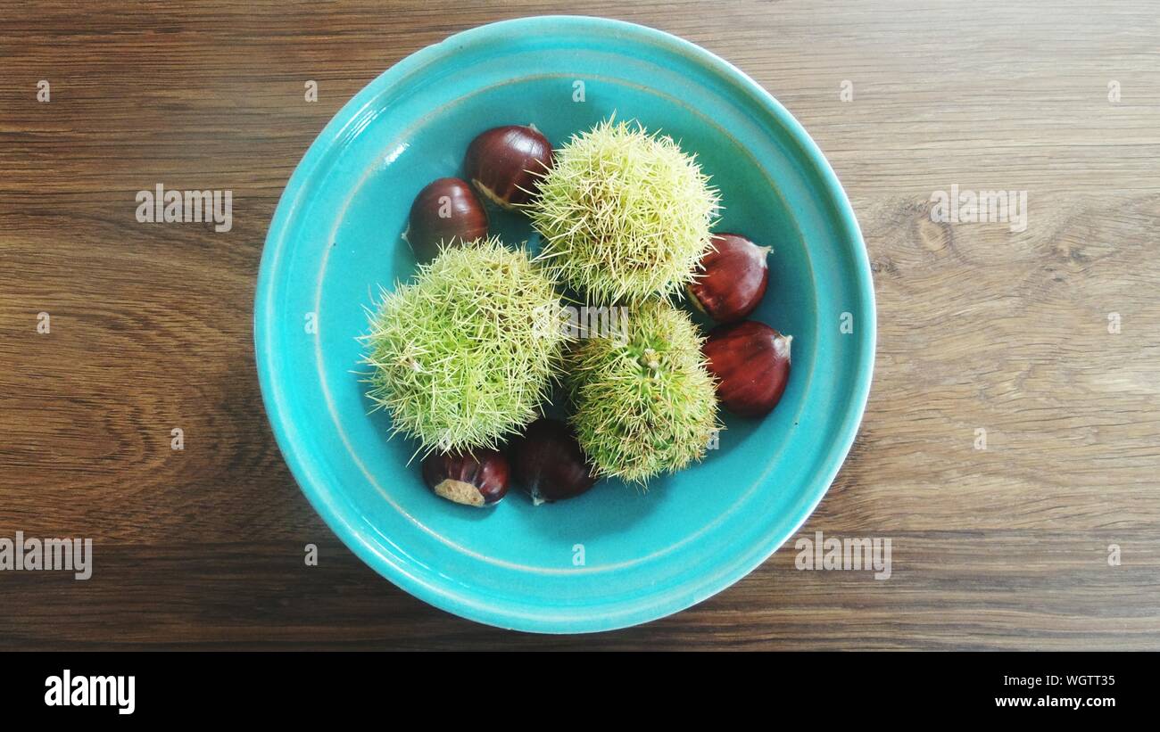 High Angle View Of Exotic Fruit And Nuts In Bowl Stock Photo