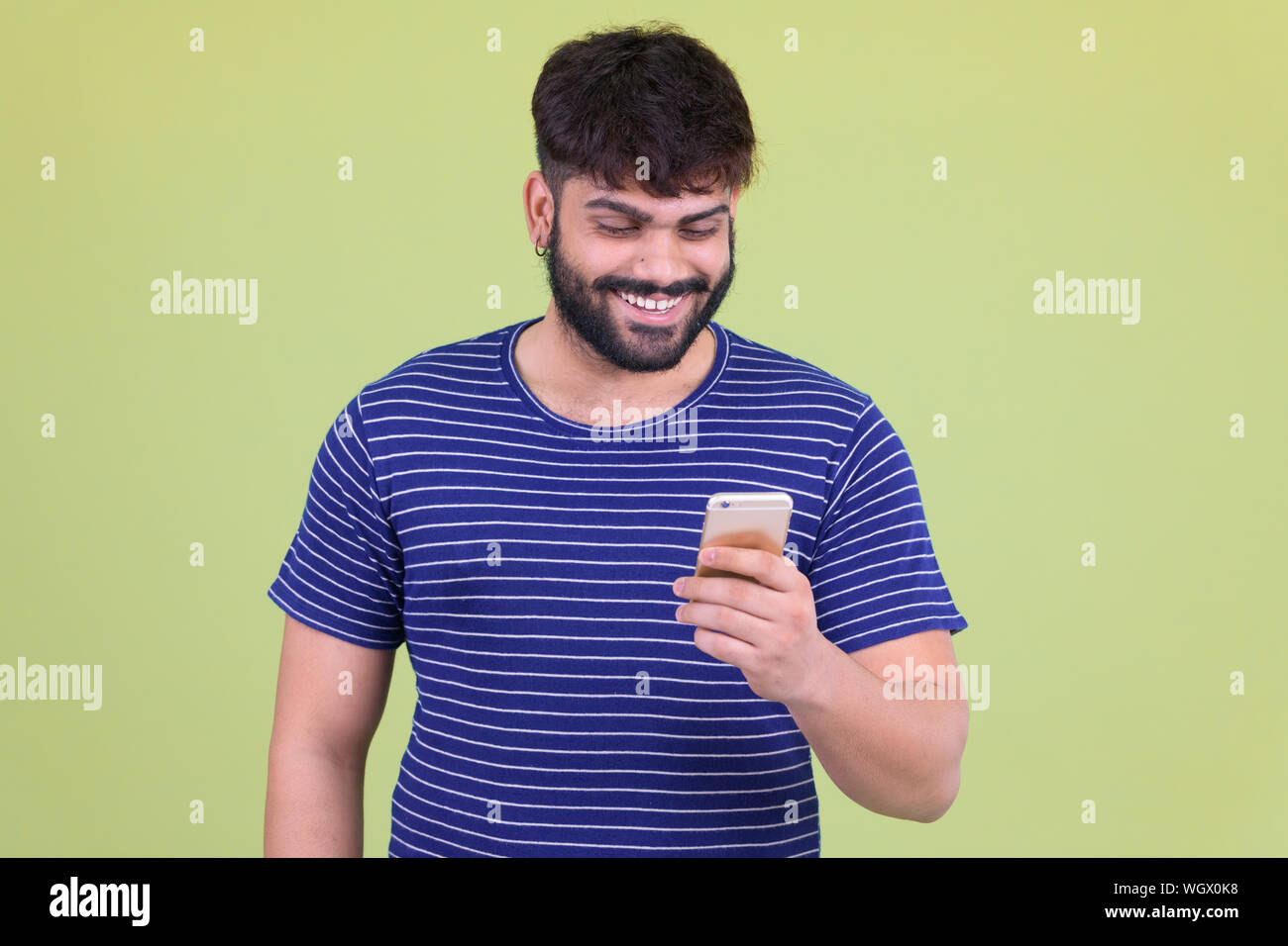Happy young overweight bearded indian hi-res stock photography and ...
