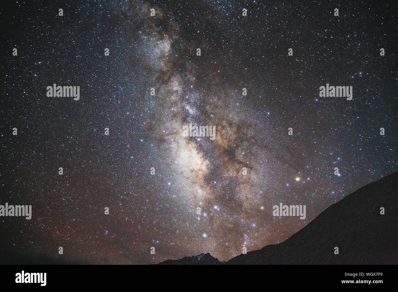 Low Angle View Of Glowing Constellations At Night Stock Photo