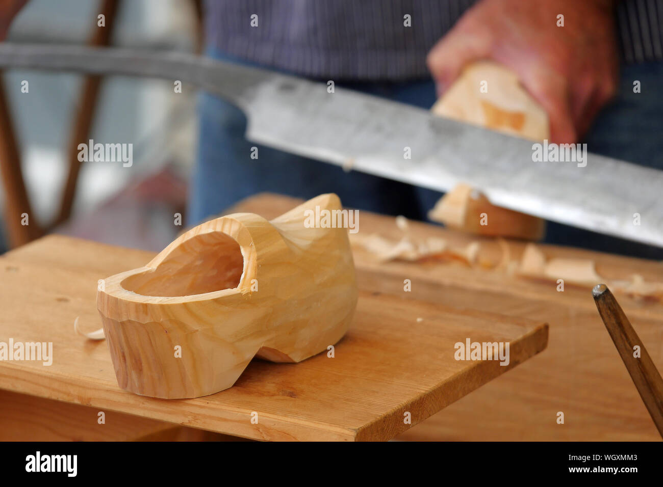 Dutch Clog Maker Crafting Wooden Clogs In Stock Photo Alamy