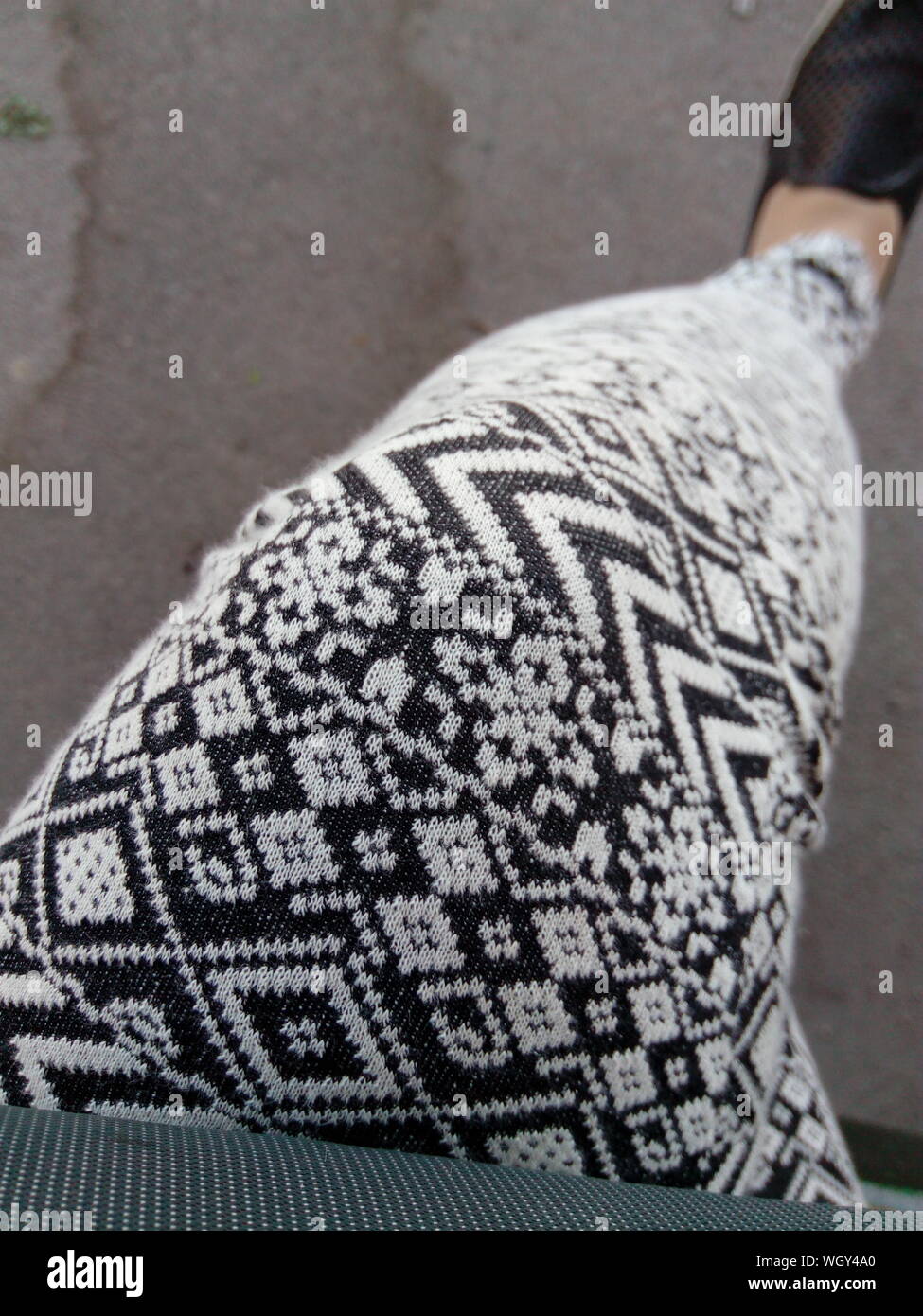 Low Section Of Woman Wearing Leggings Stock Photo