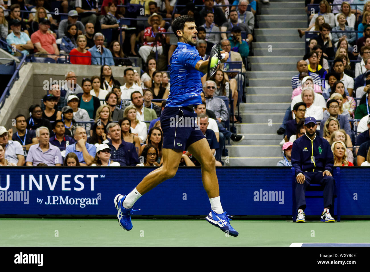 New York, USA. 01st Sep, 2019. Novak Djokovic of Serbia hits a forehand against Stan Wawrinka of Switzerland in the third round on Arthur Ashe Stadium at the USTA Billie Jean King National Tennis Center on September 01, 2019 in New York City. Credit: Independent Photo Agency/Alamy Live News Stock Photo