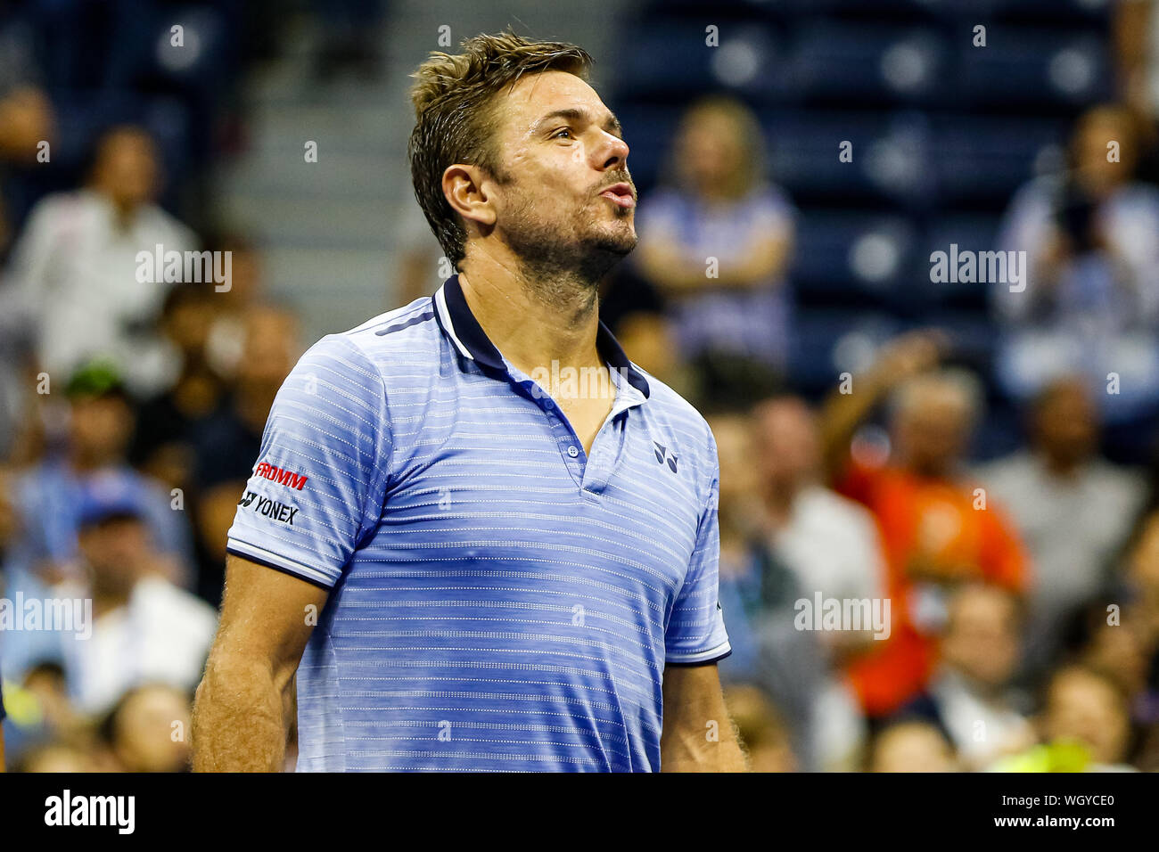 New York, USA. 01st Sep, 2019. Stan Wawrinka of Switzerland reacts during his match against Novak Djokovic of Serbia in the third round on Arthur Ashe Stadium at the USTA Billie Jean King National Tennis Center on September 01, 2019 in New York City. Credit: Independent Photo Agency/Alamy Live News Stock Photo