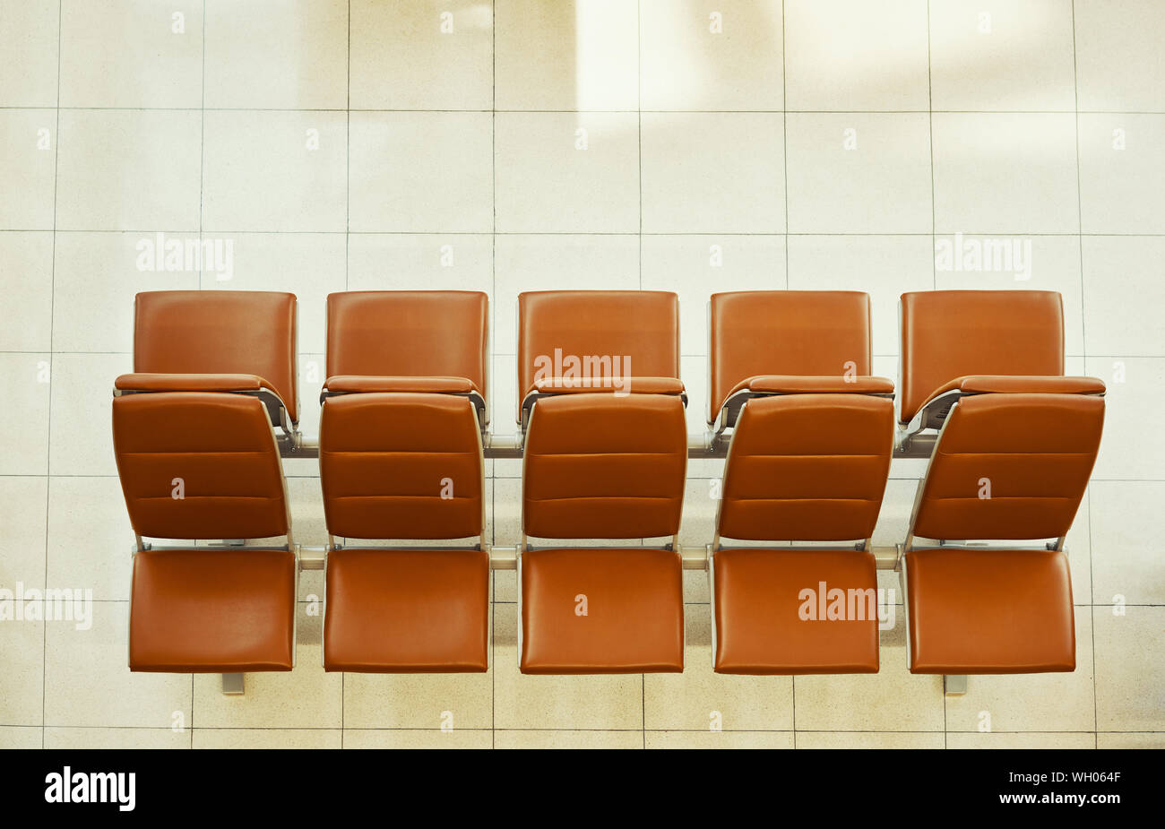 Top view of empty seats. Chairs in rows in modern airport terminal ...