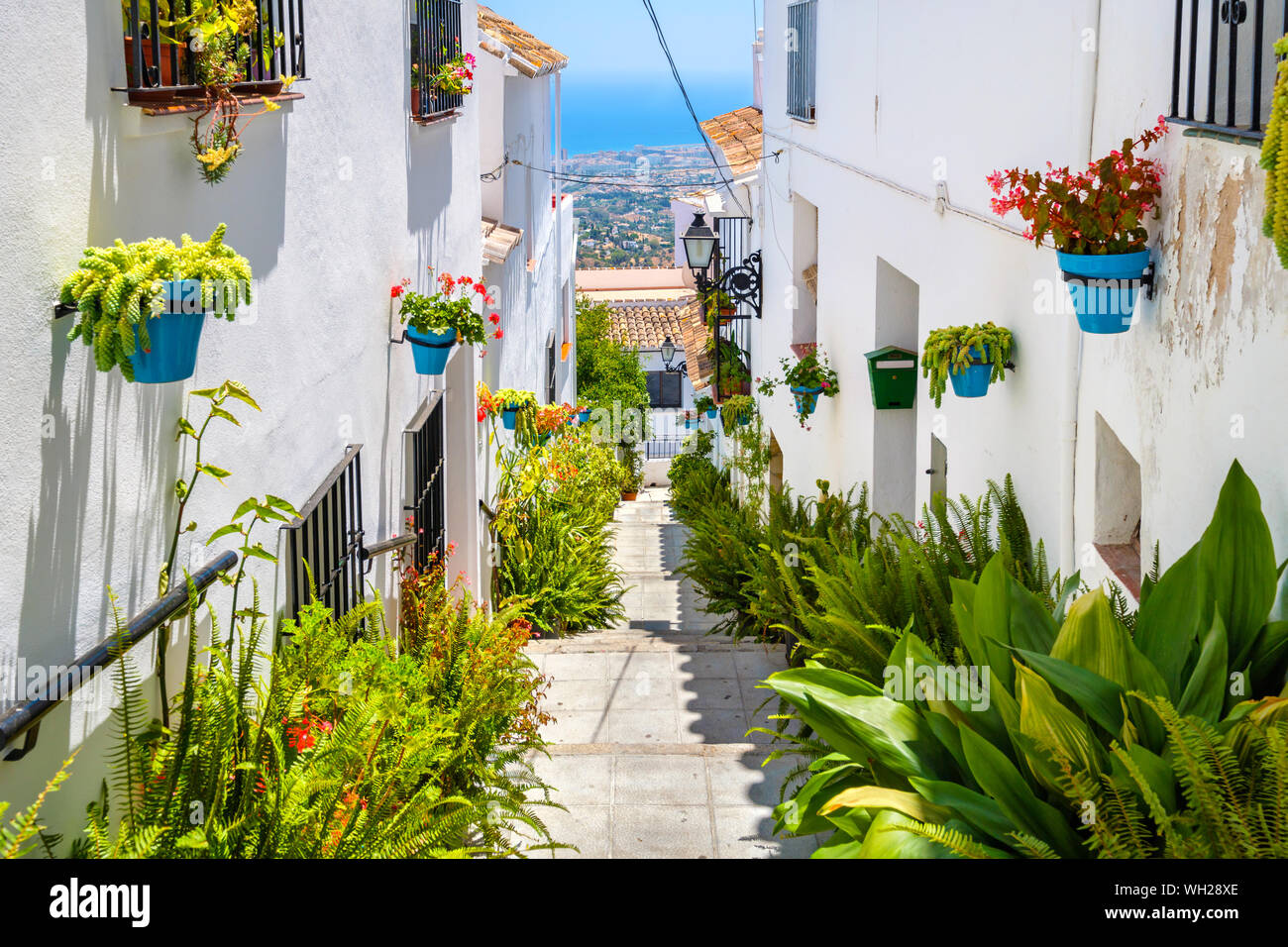 View to picturesque street of Mijas, charming white village in Andalusia. Spain Stock Photo