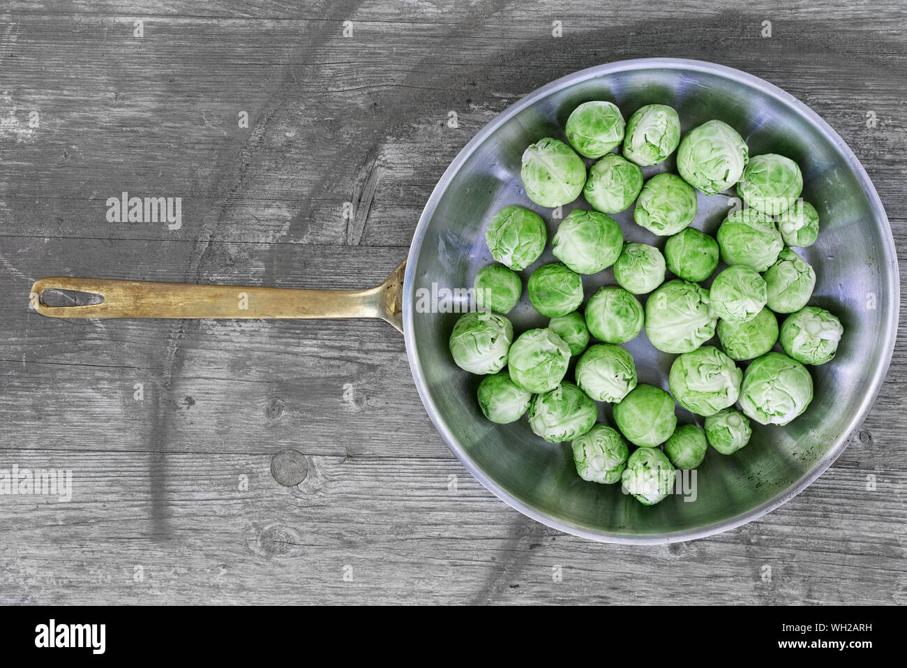 Directly Above View Of Cabbages In Cooking Utensil On Table Stock Photo