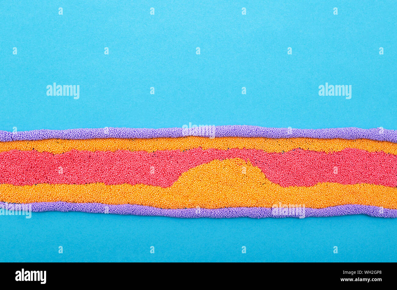 Human blood vessel fashioned from plasticine atherosclerosis vascular disease concept, copy space, aorta Stock Photo