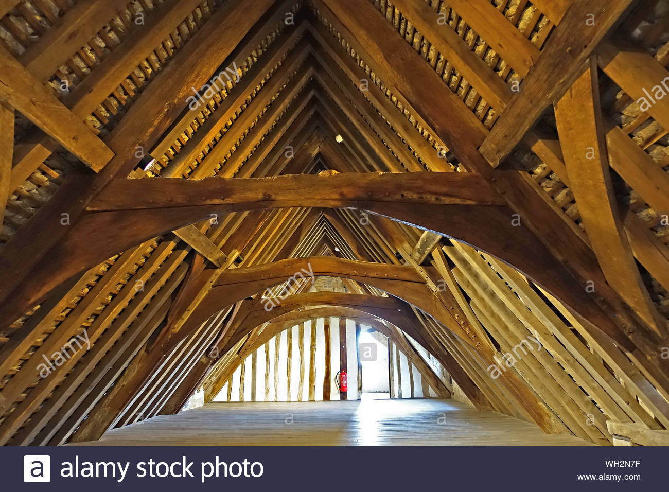 Exposed Ancient Oak Roof Trusses In Attic Of Lyddington Bede