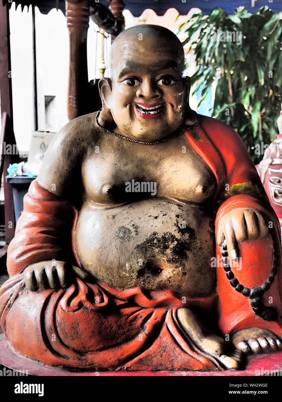 Laughing Buddha Statue At Temple Stock Photo Alamy