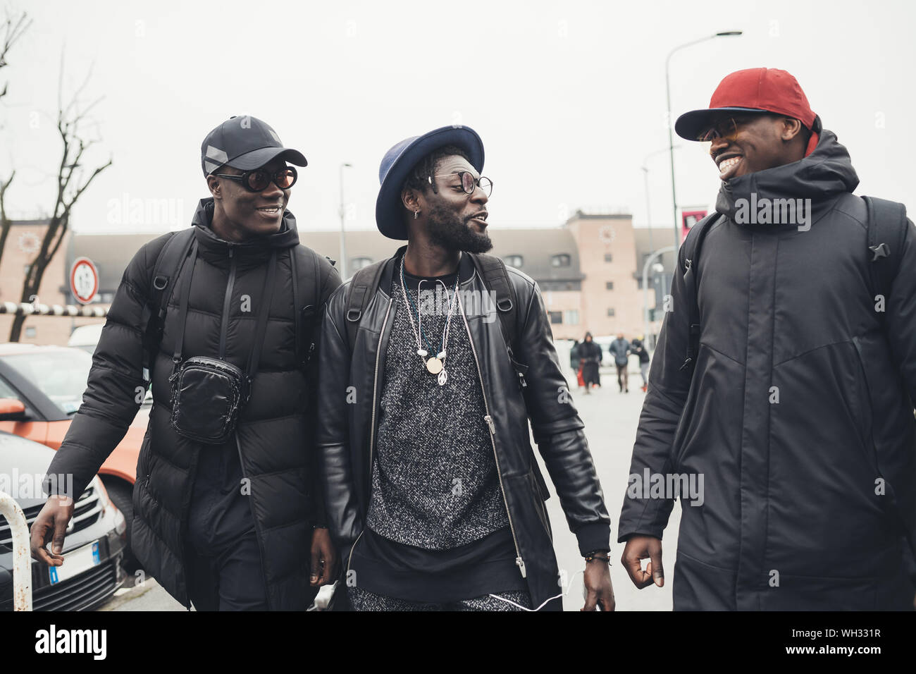 Man Interaction Three young african men talking and having fun together – relationship ...