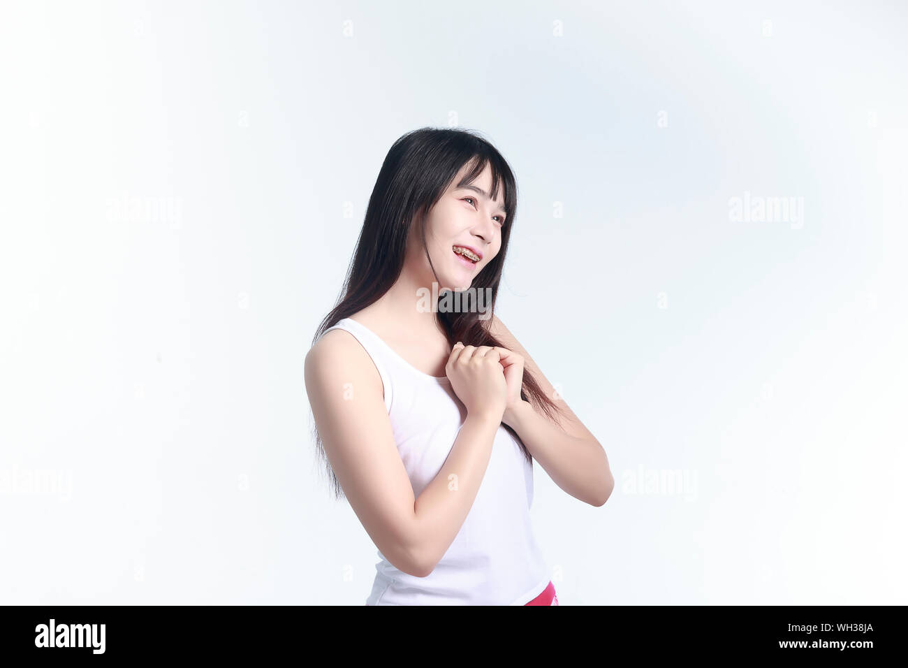 Standing happy woman hi-res stock photography and images - Alamy