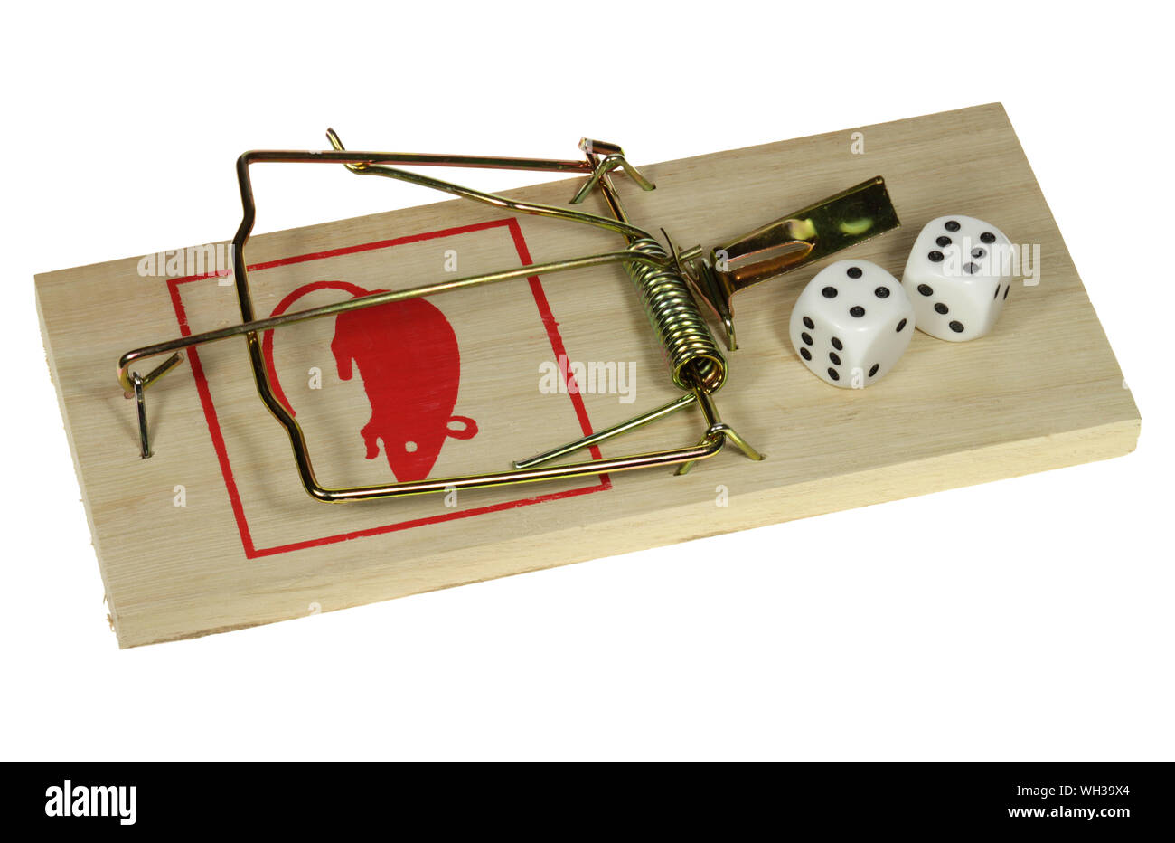 High Angle View Of Dice On Mousetrap Over White Background Stock Photo