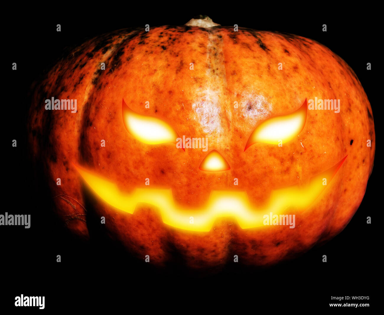 Big pumpkin with scary face for Halloween, photo manipulation Stock Photo -  Alamy