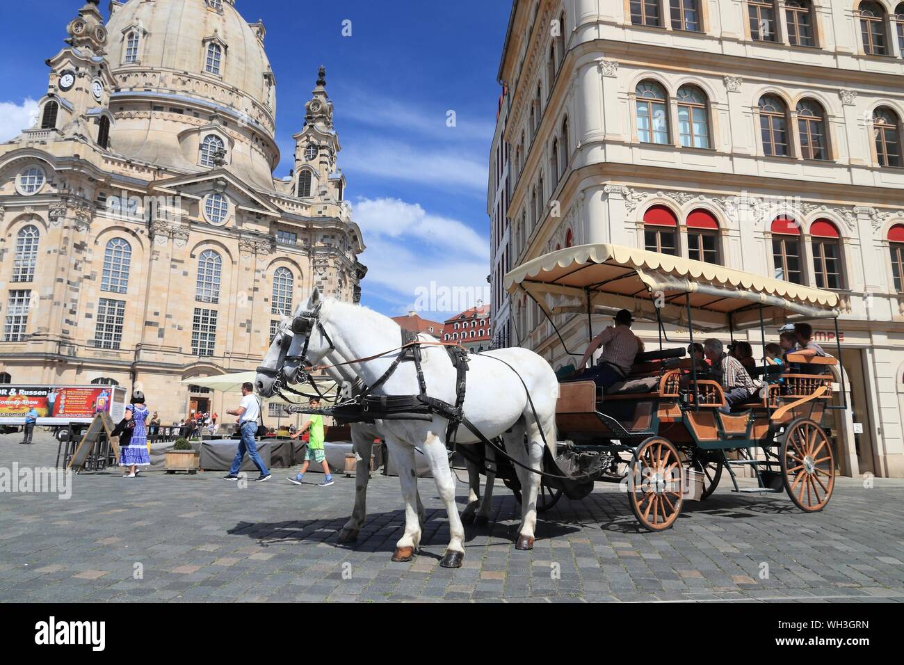 DRESDEN, GERMANY - MAY 10, 2018: Horse carriage ride at Neumarkt square in Altstadt (Old Town) district of Dresden, the 12th biggest city in Germany. Stock Photo